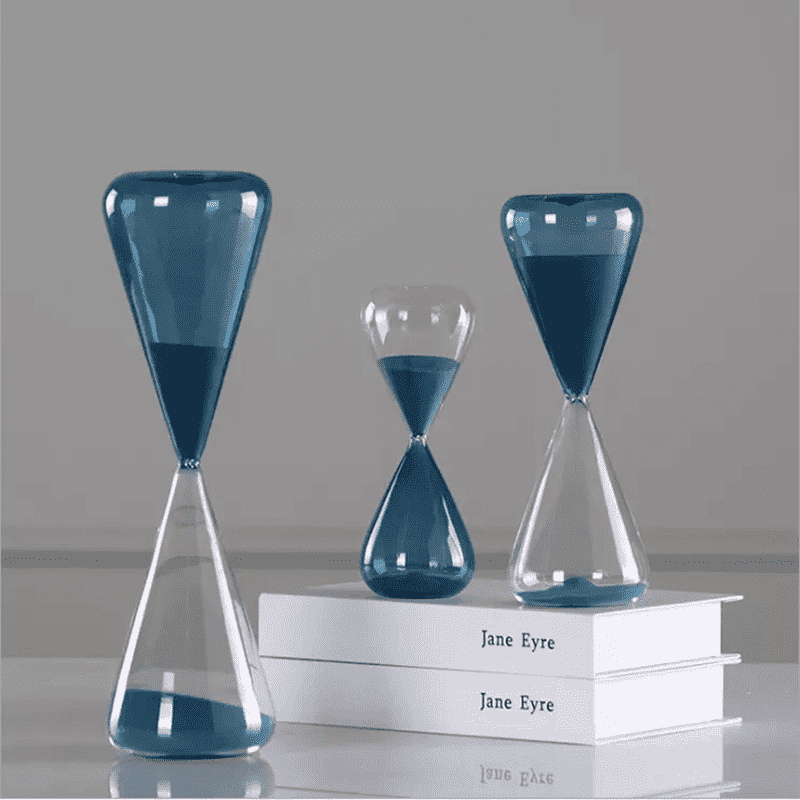 Hour glass with blue sand